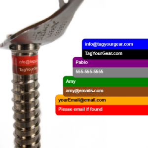 Two stripe, wide rectangular label with custom text applied to rock climbing gear